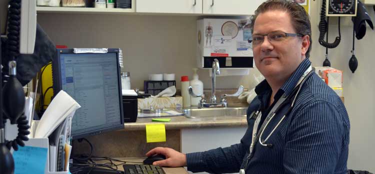 Photo of Gordon Canning, Nurse Practitioner, at work